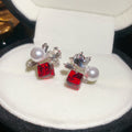 Silver Tone Red Crystal Flower Stud Earrings With Pearl Accents view 1