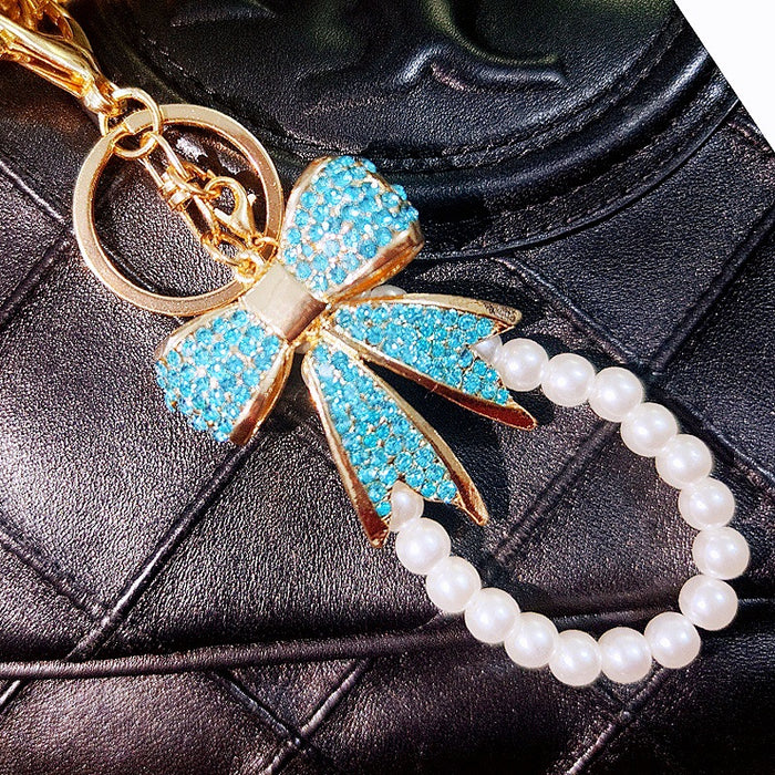 Full Crystal Bow Keychains with Plain Pearl Strand and Fortune Loop Options