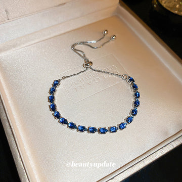 Seven Crystal Slider Bracelet Options In Blue Green Clear Or Champagne