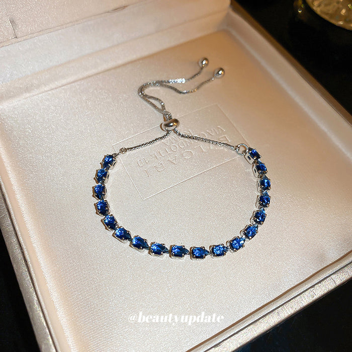 Seven Crystal Slider Bracelet Options In Blue Green Clear Or Champagne