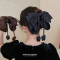 Black Oversized Satin Bow Hair Claw With Bud Shaped Ties view 1