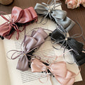Satin Ribbon Bow Banana Hair Clips Rhinestone Center Four Colors view 1