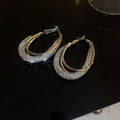 Textured Oval Hoop Earrings In Gold And Silver Tones view 6