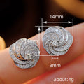 Pave Swirl Round Cluster Stud Earrings In Polished Silver Tone view 4