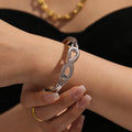 Hollow Infinity Link Bangle Stainless Steel Gold Or Steel view 2