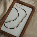 Black Faceted Bead Necklace With Pink Pearls Gold Accents view 4