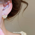 Gold Tone Butterfly Stud Earrings with Crystal Wings view 3