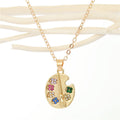 Gold Tone Artist Palette and Sweet Wrapper Pendant Necklaces view 3