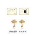 Gold Tone Openwork Iris And White Pearl Drop Stud Earrings view 3