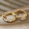 Gold Tone Star Moon Blue Clear Stone Huggie Hoop Earrings view 3