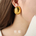 Polished Oval Dome Stud Earrings Gold Steel Finish view 1