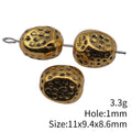 Hammered Irregular Spacer Bead in Antique Gold Tone view 3