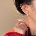 Gold-Tone Abstract Star Pearl Zirconia Stud Earrings view 2