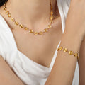 Gold Spiral Disc Link Necklace and Bracelet Metal Set view 1