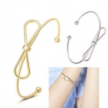 Primary supplied view of bow adjustable open bangle