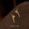 Gold Rose Bow Pearl Cascade Drop Stud Earrings Pair view 1