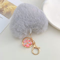 Fluffy Faux Fur Pom Pom Keychain with Glitter Flower Charm view 7