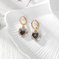 Gold Tone Faceted Crystal Heart Huggie Earrings in Eleven Color Options view 2