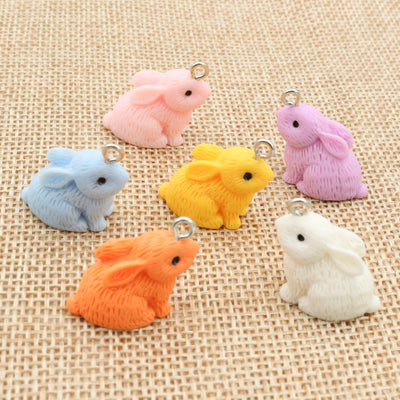 Rabbit resin charms showing assorted shapes and finishes