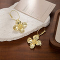 Textured Gold Tone Flower Open Hoop Statement Earrings view 2