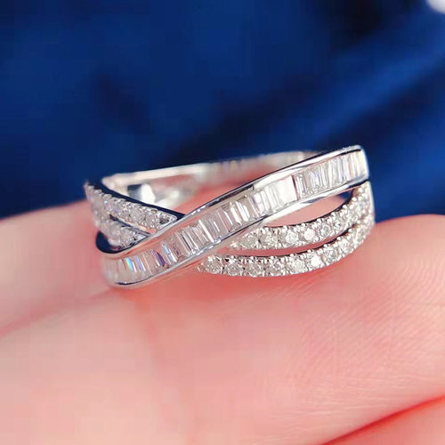 Second product view showing silver-tone baguette and round-stone crisscross multi-rail ring