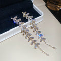 Crystal Leaf Long Drop Earrings With Polished Metal Tone Details view 6