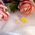Mismatched Pink Outline and Yellow Daisy Small Stud Earrings view 1
