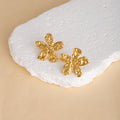 Thirty-Five Gold Tone Floral and Sculptural Stud Earrings view 9