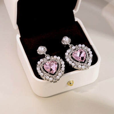 Primary supplied view of pink heart pearl-look halo earrings