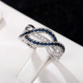 Silver Tone Blue And Clear Interwoven Infinity Ring view 2