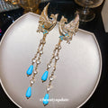 Phoenix and Blue Teardrop Tassel Earrings in Gold Tone view 2