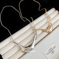 Sculptural Curved Pendant Necklace in Gold and Silver view 4
