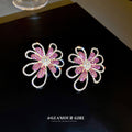 Pink Crystal Open Flower Statement Earrings With Polished Metal Tone Details view 1