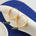 Gold And Steel Geometric Flat Band Hoop Earrings Pair view 2