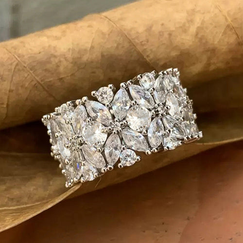 Second product view showing extra-wide silver-tone floral mixed-shape clear-stone ring