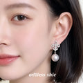 Silver Tone Clear Stone Fleur De Lis Large Pearl Drop Earrings view 2