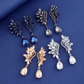 Gold Tone Champagne Leaf Curve Tassel Crystal Four Designs Metal Dangle Earrings view 4