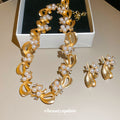 Gold Pearl Bow Ribbon Necklace Matching Stud Earrings view 1