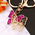 Hollow Crystal Butterfly Keychains in White Fuchsia and Yellow view 1