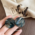 Marbled Resin Geometric Stud Earrings in Two Shapes view 2