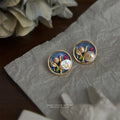 Gold Tone Blue Round Floral Scene And White Flower Stud Earrings view 4