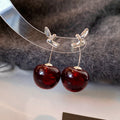 Dark Red Cherry Drop Earrings with Silver Tone Bows view 1