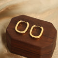 Gold Polished Oval U-Shape Huggie Hoop Earrings Three Sizes view 3