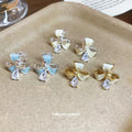 Butterfly Flower Ear Clips in Three Pastel Colorways view 4
