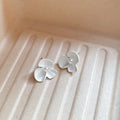 Sculpted Flower Stud Earrings in Gold Tone and White view 7