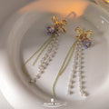 Gold Tone Bow Purple Flower Pearl And Chain Tassel Stud Earrings view 4