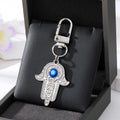 Gold and Silver Tone Crystal Hamsa Hand Evil Eye Clip Keychains in Ten Designs view 2