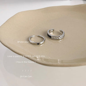 Silver Tone Open Ring with Square Cut Stones and Black Enamel Band