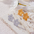 Five Petal Flower Stud Earrings Gold and Steel Finishes view 2