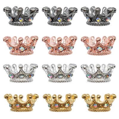 Iridescent crown beads arranged on a light background